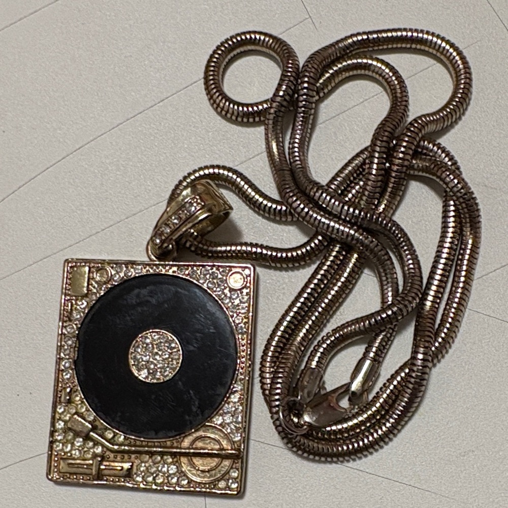 Gold and Black Turntable Pendant Necklace 16” chain